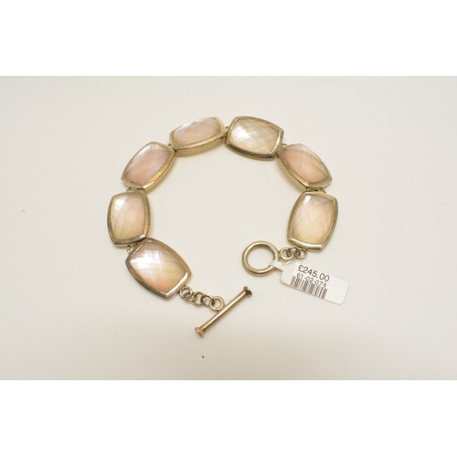 371 - Silver white mother of pearl items consisting bracelet and ring, all stamped 925, new with tags