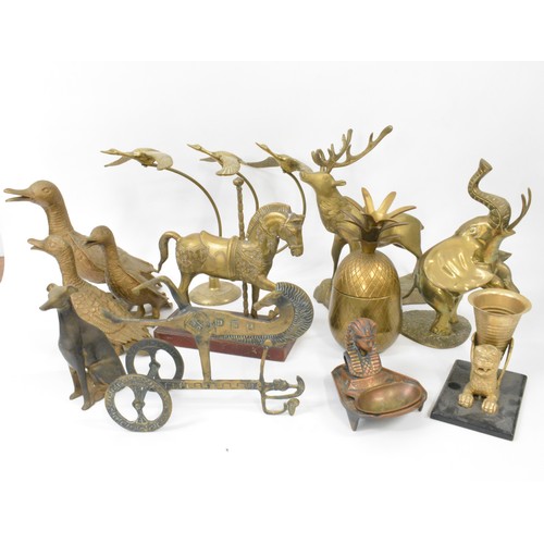 77 - A group of brassware items to include flying ducks, ducks, fairground rocking horse, etc