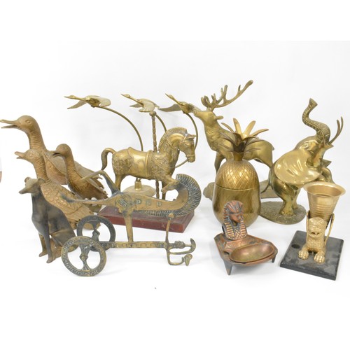 77 - A group of brassware items to include flying ducks, ducks, fairground rocking horse, etc