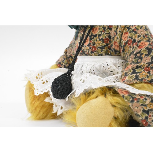 7 - Beardwell Dressed bear, approx size 29cms including bonnet, dress and apron with a pomander around h... 