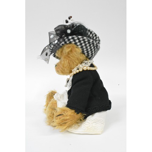 11 - Beardwell designed dressed bear with hat,pearl necklace, butterfly brooch. Size 28cms [11