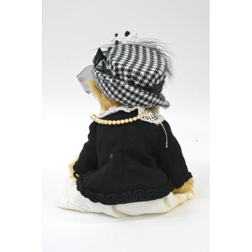 11 - Beardwell designed dressed bear with hat,pearl necklace, butterfly brooch. Size 28cms [11