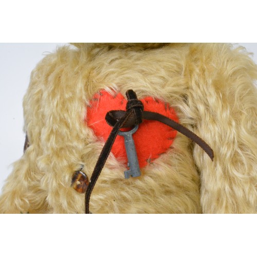 34 - Light brown Beardwell 'patches' bear with red heart and key, moveable limbs, height 38 cms [15