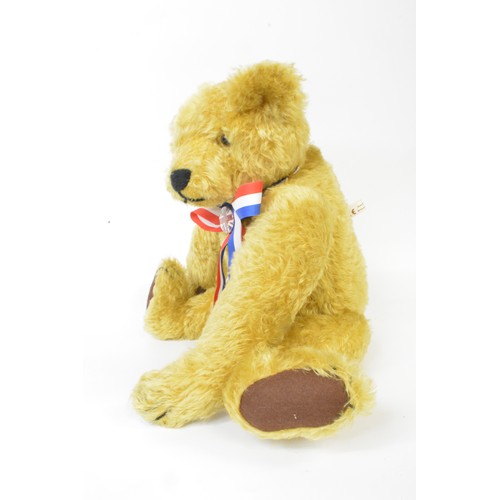 36 - Honey coloured bear with union jack colours neck tie with badge, height 43 cms [17