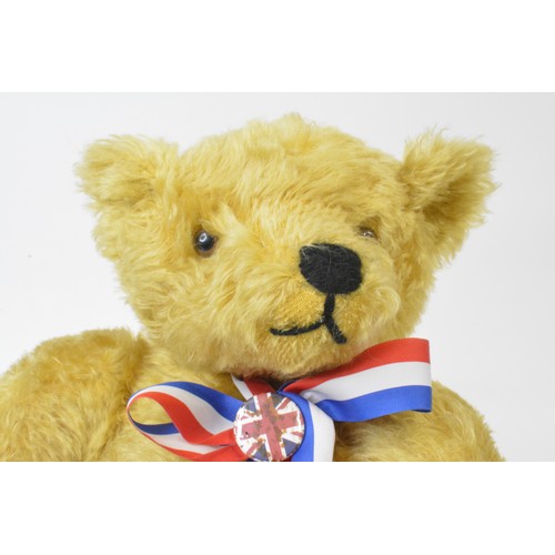 36 - Honey coloured bear with union jack colours neck tie with badge, height 43 cms [17