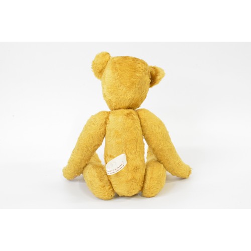 45 - Yellow Beardwell bear with suede paws and pads, moveable limbs, approx. height 35 cms [14