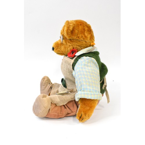 47 - B.M.Beardwell dressed 'Gardener' bear with glasses holding a basket of fruit, size 43cms [17