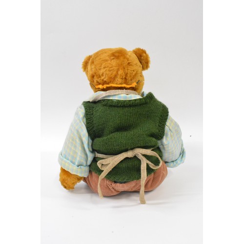 47 - B.M.Beardwell dressed 'Gardener' bear with glasses holding a basket of fruit, size 43cms [17