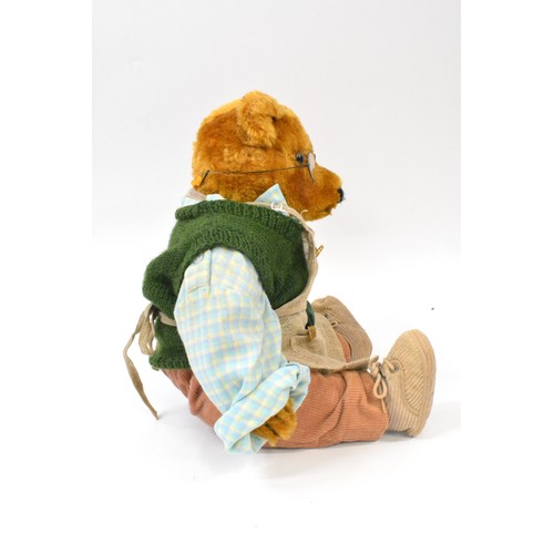 47 - B.M.Beardwell dressed 'Gardener' bear with glasses holding a basket of fruit, size 43cms [17