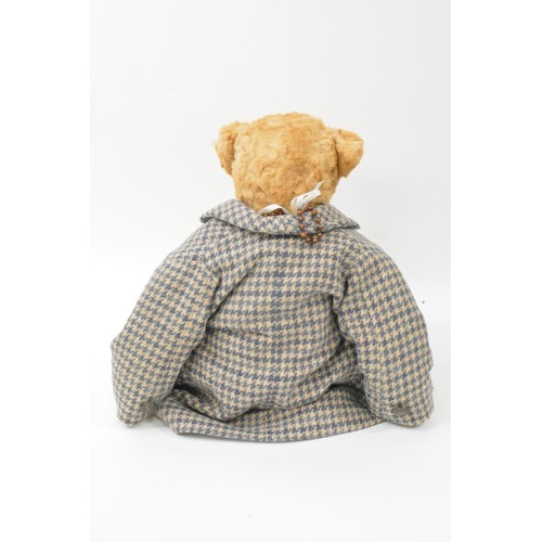 53 - Designed and made by B.M.Beardwell  bear with dress, blue tweed coat and blue shoes and necklace, he... 