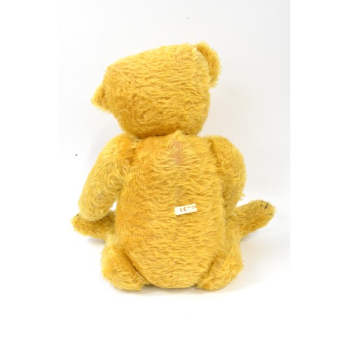 57 - Golden colour Beardwell Designed Bear, with suede paws and hands, approx 63 cms tall [25