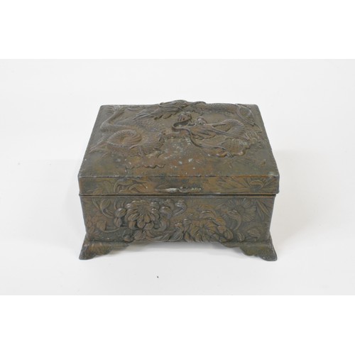 109 - Oriental jewellery box with dragon design to top and floral decoration to sides