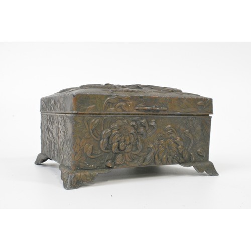 109 - Oriental jewellery box with dragon design to top and floral decoration to sides