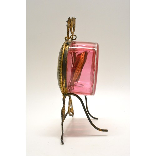 115 - Antique pocket watch display case, cranberry glass with bevelled edge, Ormolu design to stand. Appro... 