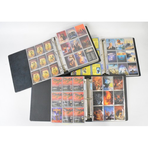 129 - x3 Folders  containing complete collector / trading cards pertaining to various year during the 1990... 