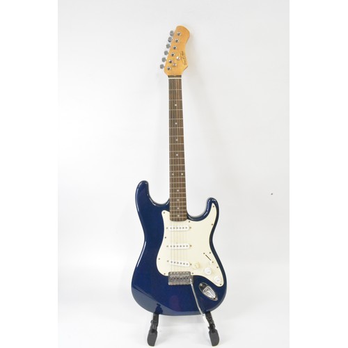 130 - Gear 4 Music six string electric blue guitar with carrier and Microphone (stand not included, no cab... 