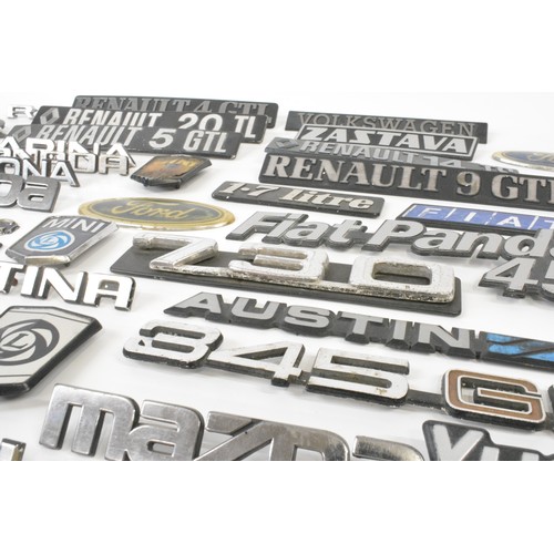 133 - Selection of car badges to include Ford, Rover, Volkswagen, Mini, Datsun Sunny, etc