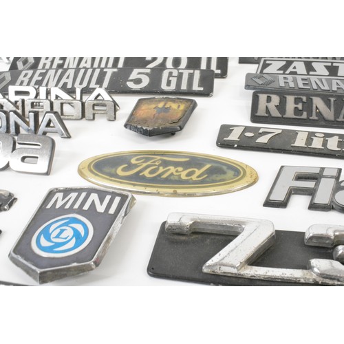 133 - Selection of car badges to include Ford, Rover, Volkswagen, Mini, Datsun Sunny, etc