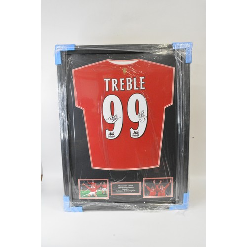 134 - Framed Manchester United  Teddy Sheringham and Ole Gunnar Solskjaer signed shirt 2022, with Certific... 