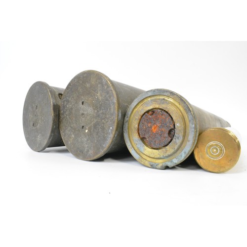 147 - Military Interest - Group of artillery shell casings mixed size and oil can marked M G Mk3 BSM 1973