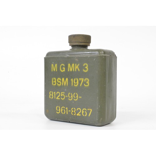 147 - Military Interest - Group of artillery shell casings mixed size and oil can marked M G Mk3 BSM 1973