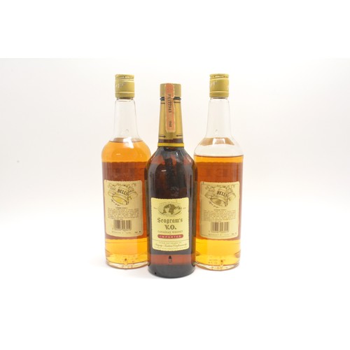 211 - Three bottles-1 Seagram's V.O. Canadian whisky, 70cl, 40% and 2 Bell's Extra Special, 75cl,40%, 1980... 