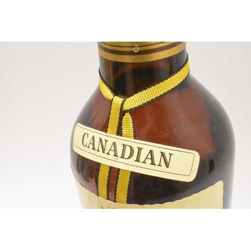 211 - Three bottles-1 Seagram's V.O. Canadian whisky, 70cl, 40% and 2 Bell's Extra Special, 75cl,40%, 1980... 