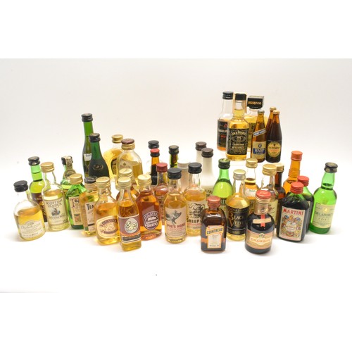 215 - One box x 40 assorted miniatures consisting of whiskies, cognacs, rums, liqueurs, ports etc