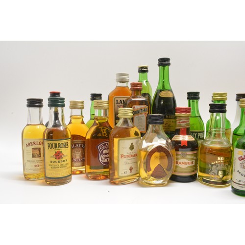 216 - One box 40 assorted miniatures to include cognacs,rums,whiskies,ports etc