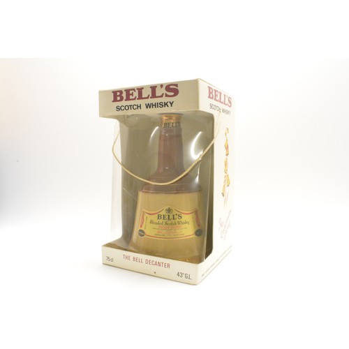 228 - Three decanter bottles, one HM Queen Elizabeth 75th birthday together with two Bell's Extra Special,... 