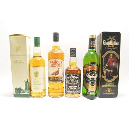 229 - One bottle tubed Glenfiddich,70cl,40%,1990, one litre The Famous Grouse,40%, 1990, one bottle Jack D... 