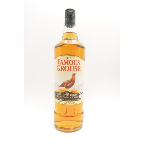 229 - One bottle tubed Glenfiddich,70cl,40%,1990, one litre The Famous Grouse,40%, 1990, one bottle Jack D... 