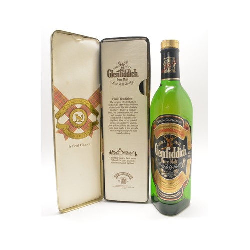 229 - One bottle tubed Glenfiddich,70cl,40%,1990, one litre The Famous Grouse,40%, 1990, one bottle Jack D... 