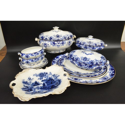 259 - Blue and white mixed dinner ware items consisting lidded terrines, and platters etc. some marked Pek... 