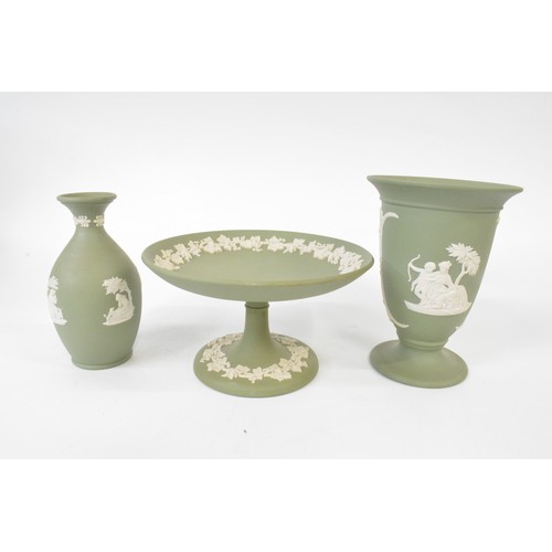 267 - A group of Wedgwood items including Jasperware, glass paperweight and urn.