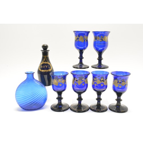 273 - Cobalt blue glasses (x6) with gilded vine decoration together with Georgian Bristol blue 'soy' condi... 