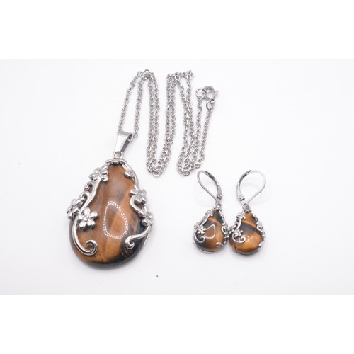 283 - Silver Tigers eye pendant  with matching earrings, Stainless steel.