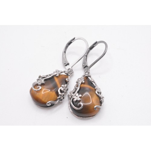 283 - Silver Tigers eye pendant  with matching earrings, Stainless steel.