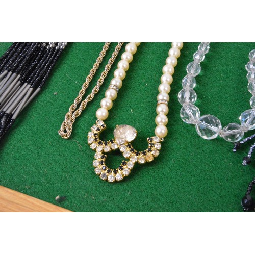 288 - Various necklaces on boards (x2 boards not included]