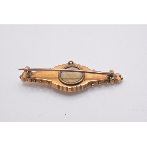 291 - Edwardian mourning brooch, hallmarked 15ct Chester, approx 3.25g.