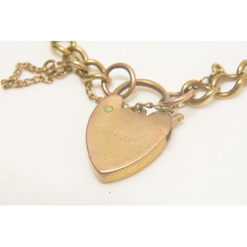 295 - 9ct gold charm bracelet, approx gross weight 11.2g together with 9ct gold dolphin pin brooch and pre... 