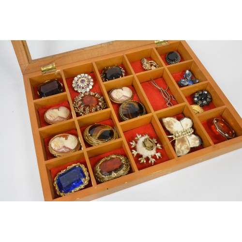 296 - Various pin brooches, to include wooden  case (excludes display cushions)