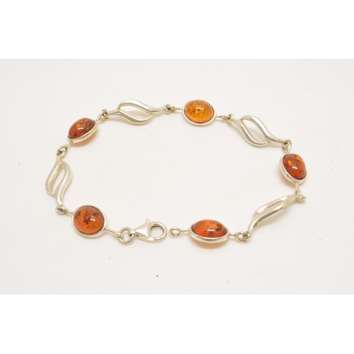 303 - Silver and amber necklace, bracelet and earrings stamped 925, all with boxes.