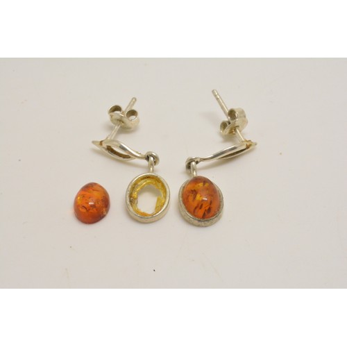 303 - Silver and amber necklace, bracelet and earrings stamped 925, all with boxes.