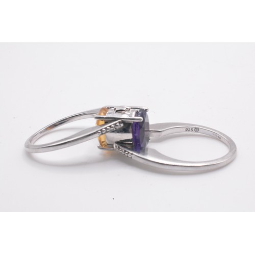 308 - x4 rings, predominately stamped 925. One flip ring with purple/yellow stones, Sizes O-Q.