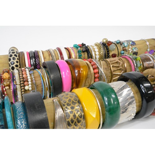 330 - Costume Jewellery collection of  bracelets in  various colours and designs and in excess of 120, [st... 