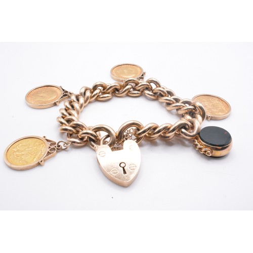 333 - 9ct gold link bracelet with padlock clasp, with attached x4 gold coins/fob charm - all links and cla... 