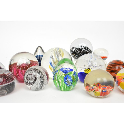 9 - A group of glass paperweights, various flower, millefiori, fish and other designs (x13)