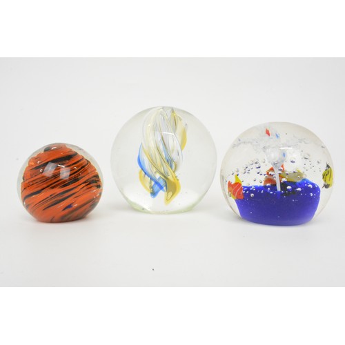 9 - A group of glass paperweights, various flower, millefiori, fish and other designs (x13)