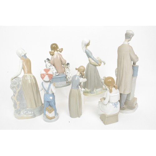 17 - Collection of Lladro (x4) and Nao figures (x2) to include girl with 3 dalmatians, painter 13.5